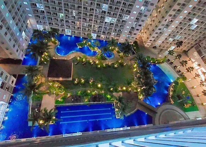 Staycation One Bedroom Balcony W Pool View Near Smx Sm Moa Ikea Naia Dfa Ocean Park